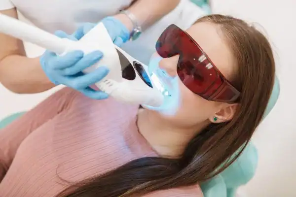 Woman having Blue Light Teeth Whitening Waterlooville